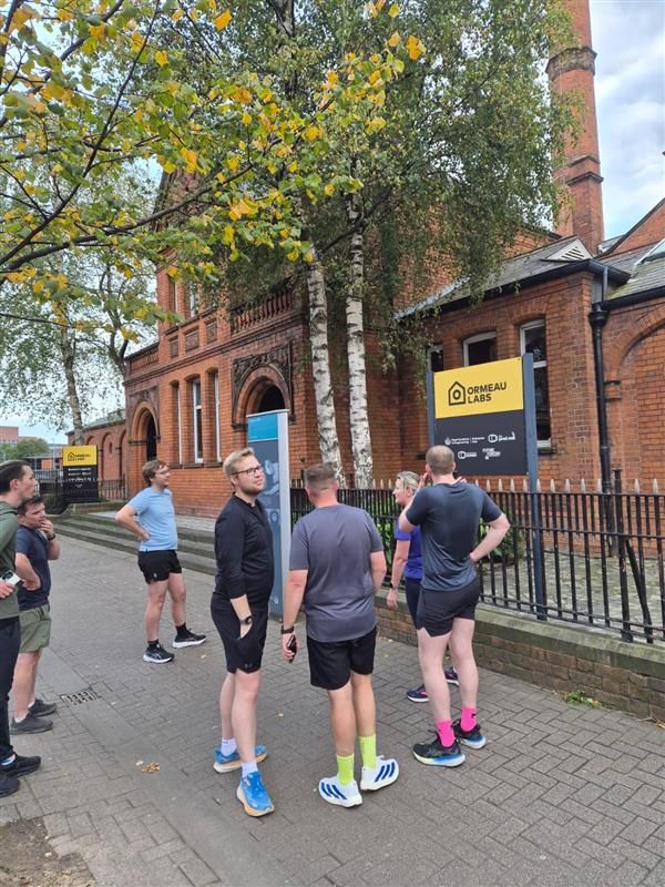 Runners gathering outside Ormeau Labs for the Innovators Loop